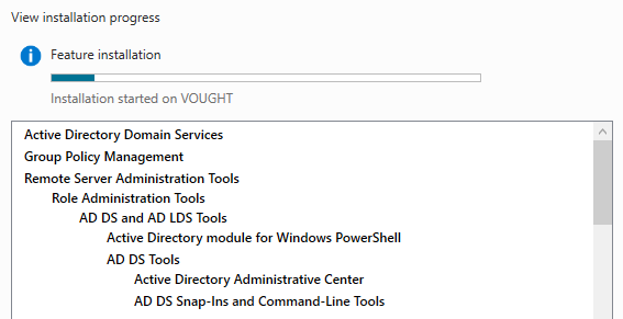 Server Manager role installation progress showing features being installed with a progress tree
